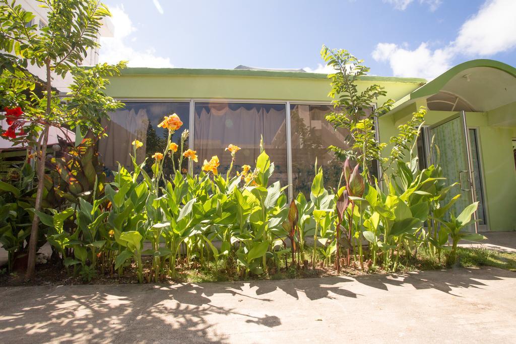 G.T. Guest House Garapan Buitenkant foto