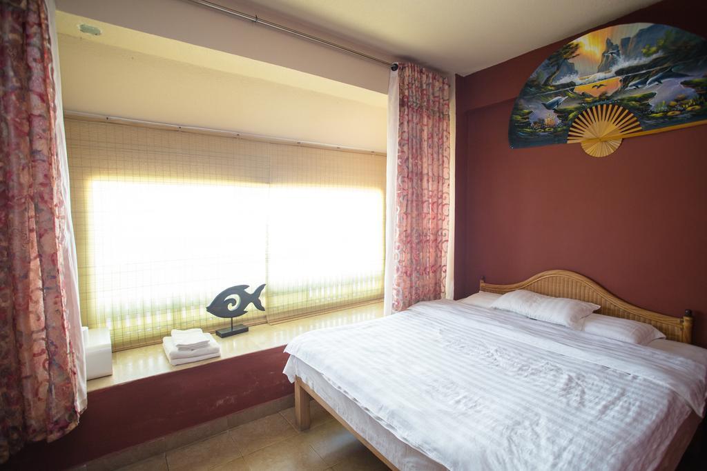 G.T. Guest House Garapan Kamer foto
