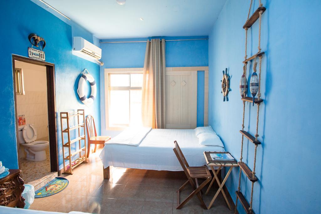 G.T. Guest House Garapan Kamer foto