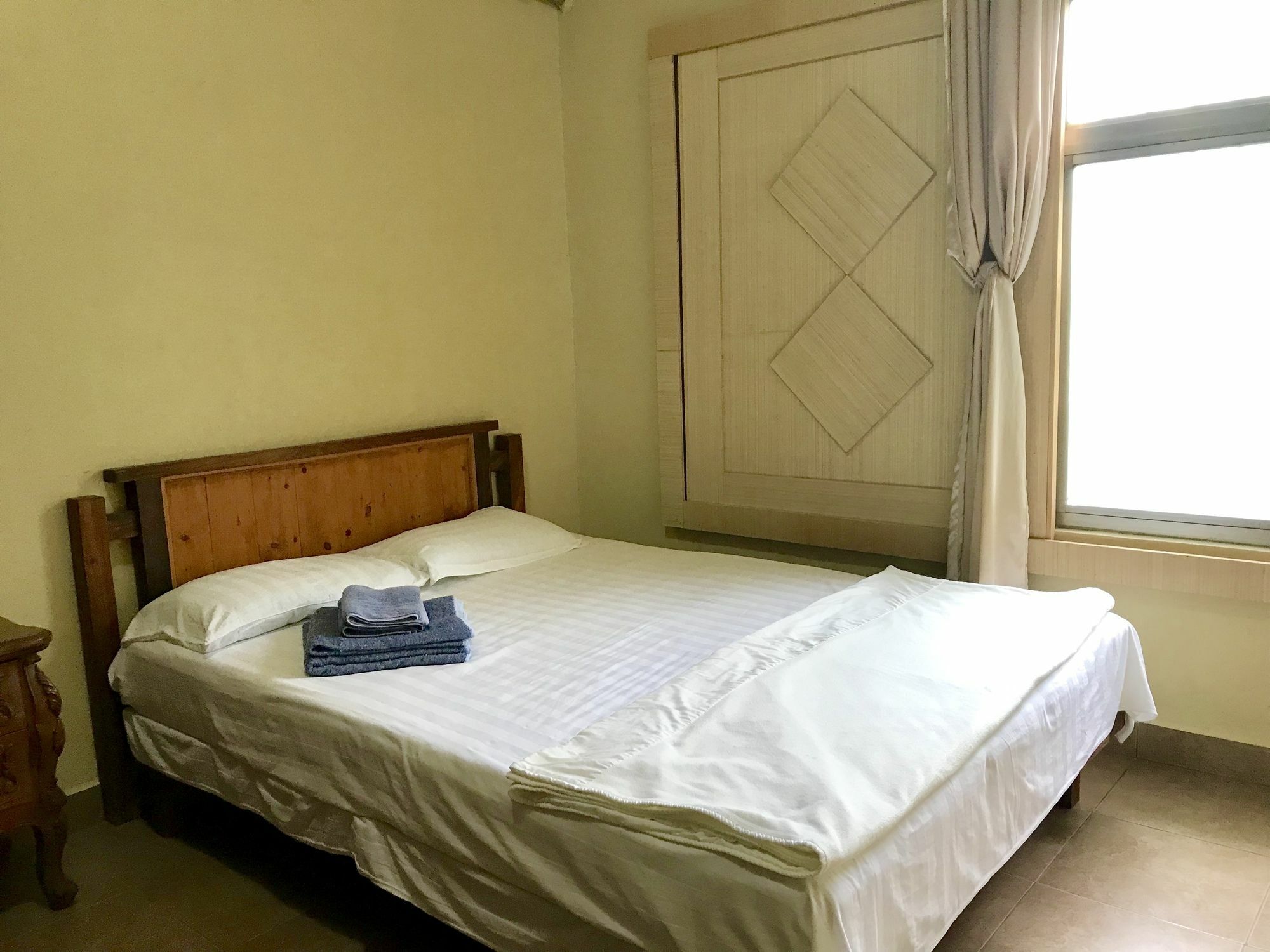 G.T. Guest House Garapan Buitenkant foto